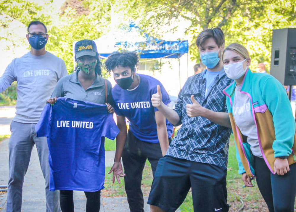 volunteers in Live United shirts