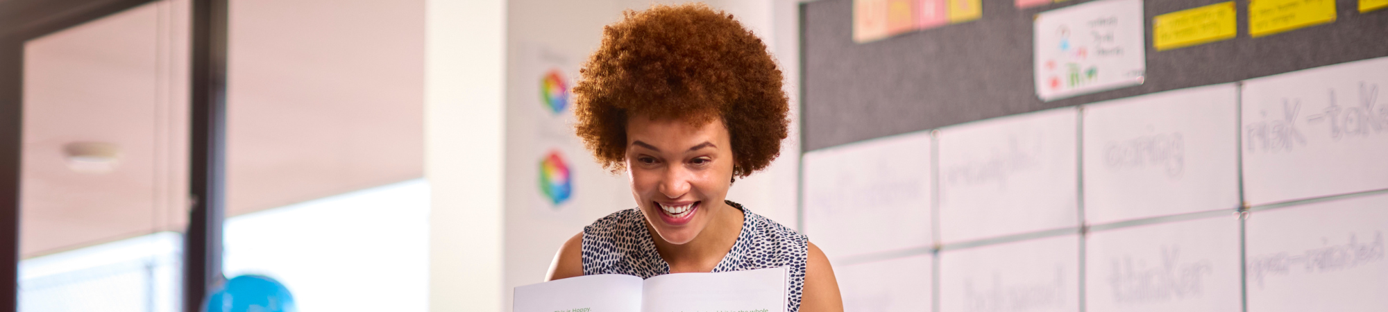 teacher smiling at students