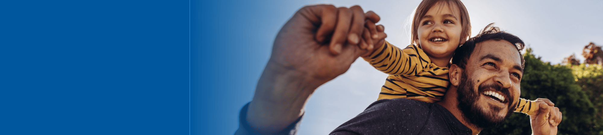 father with child on his shoulders