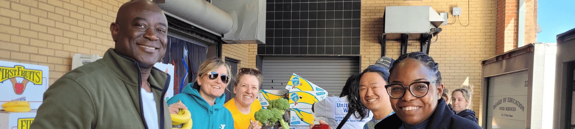 volunteers packing food