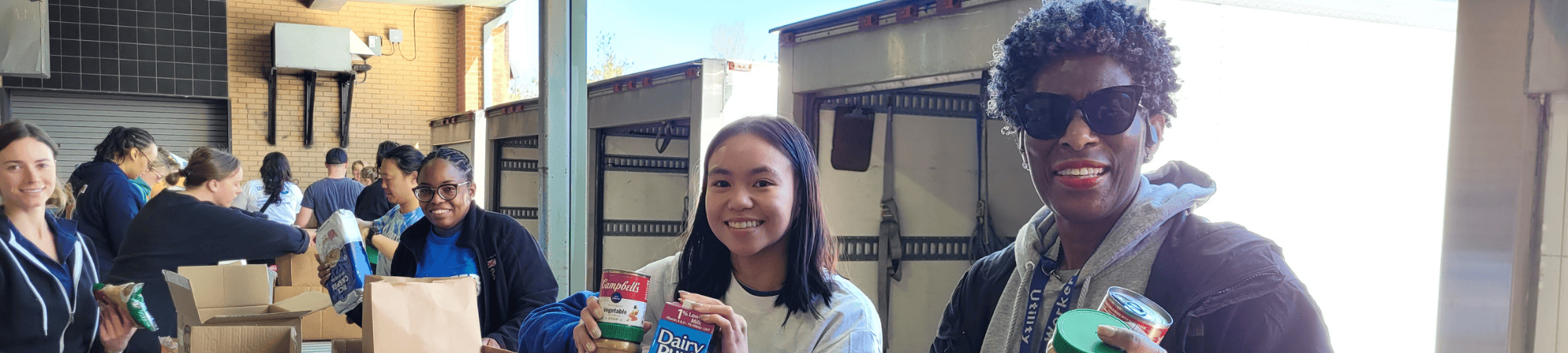 food pantry volunteers smiling