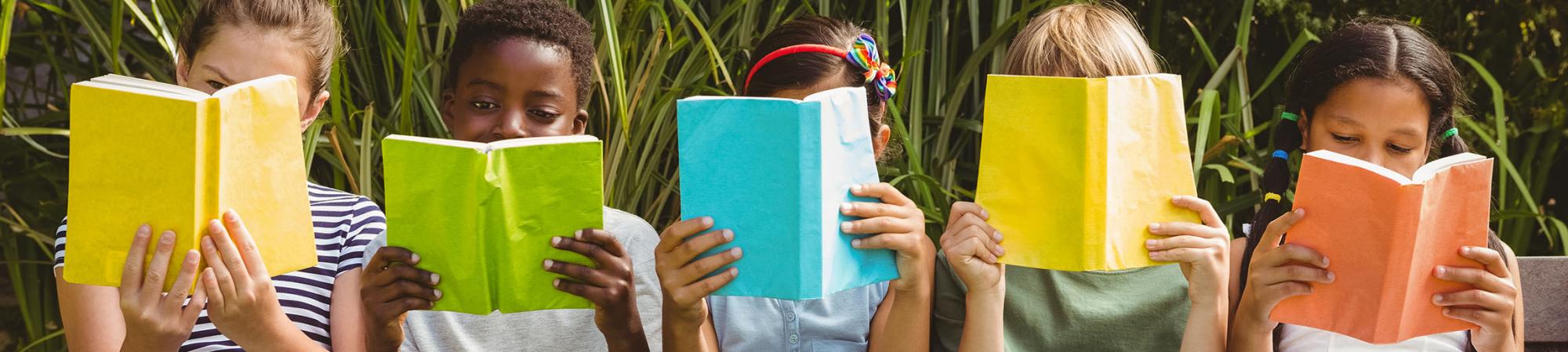 kids looking at books